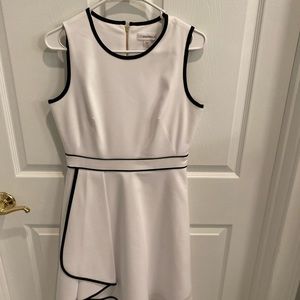 Lot of 8 black and white dresses, size 6.